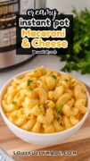 Instant Pot Macaroni and cheese is shown in a white bowl, garnished with parsley and the instant pot is in the background.