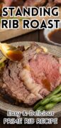 Standing rib roast is sliced and a spoon is dripping au jus over it in this image of the easy and delicious prime rib recipe.