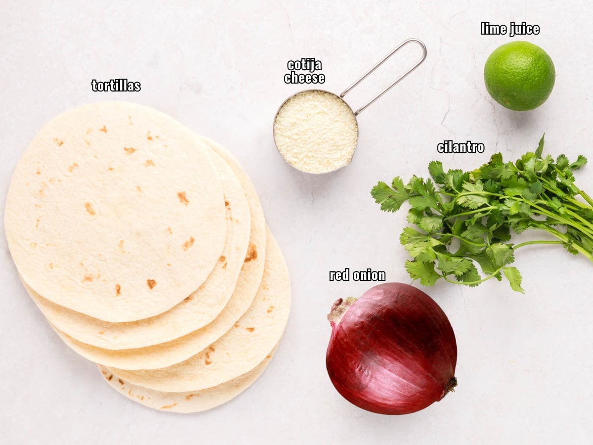 Labeled ingredients needed for carne asada tacos.