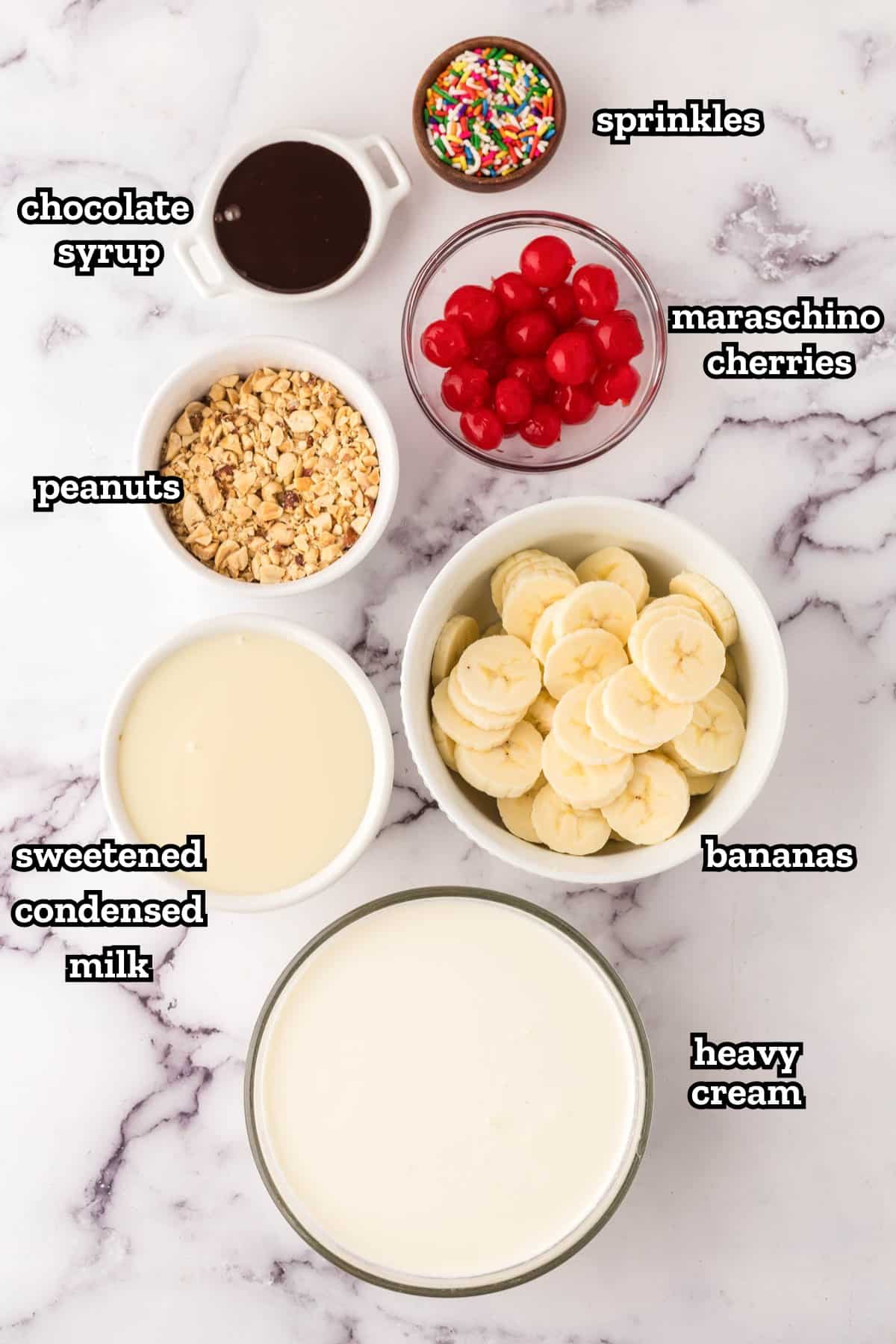 Labeled ingredients needed to make banana split ice cream.