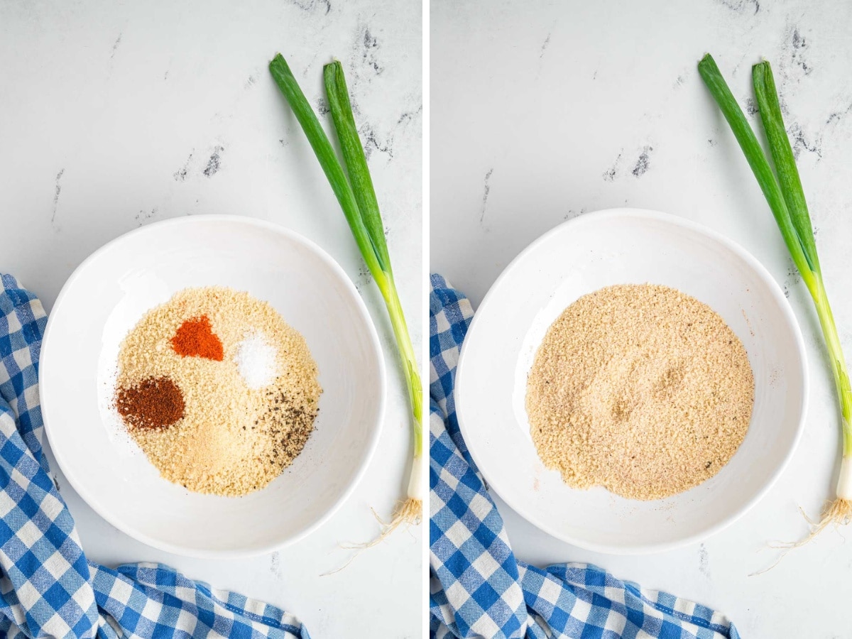 Spices added to panko crumbs in a bowl and mixed together.