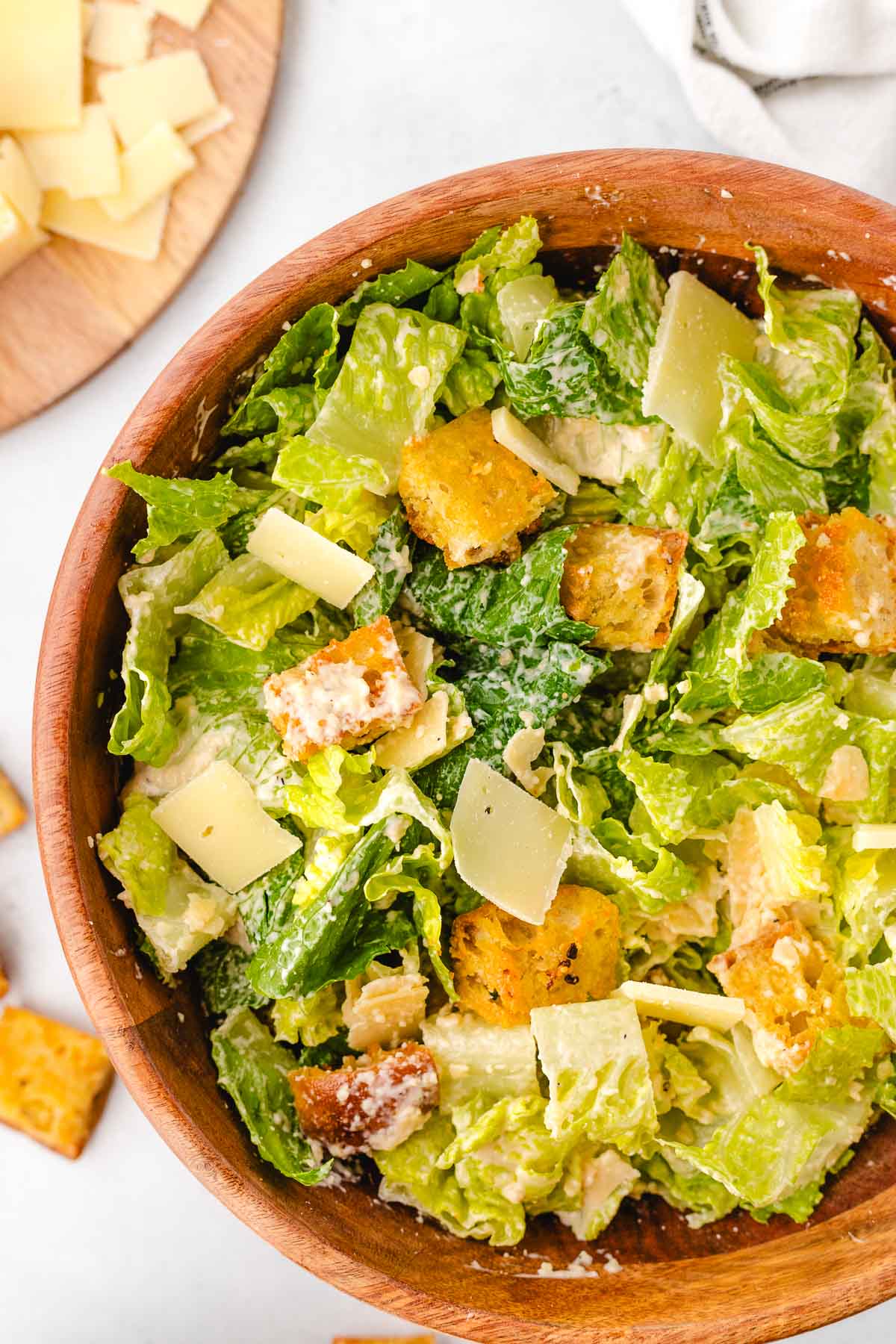 Homemade Caesar salad in a wooden bowl.