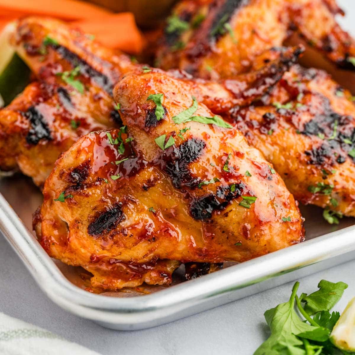 Honey chipotle barbecue wings on the silver tray.