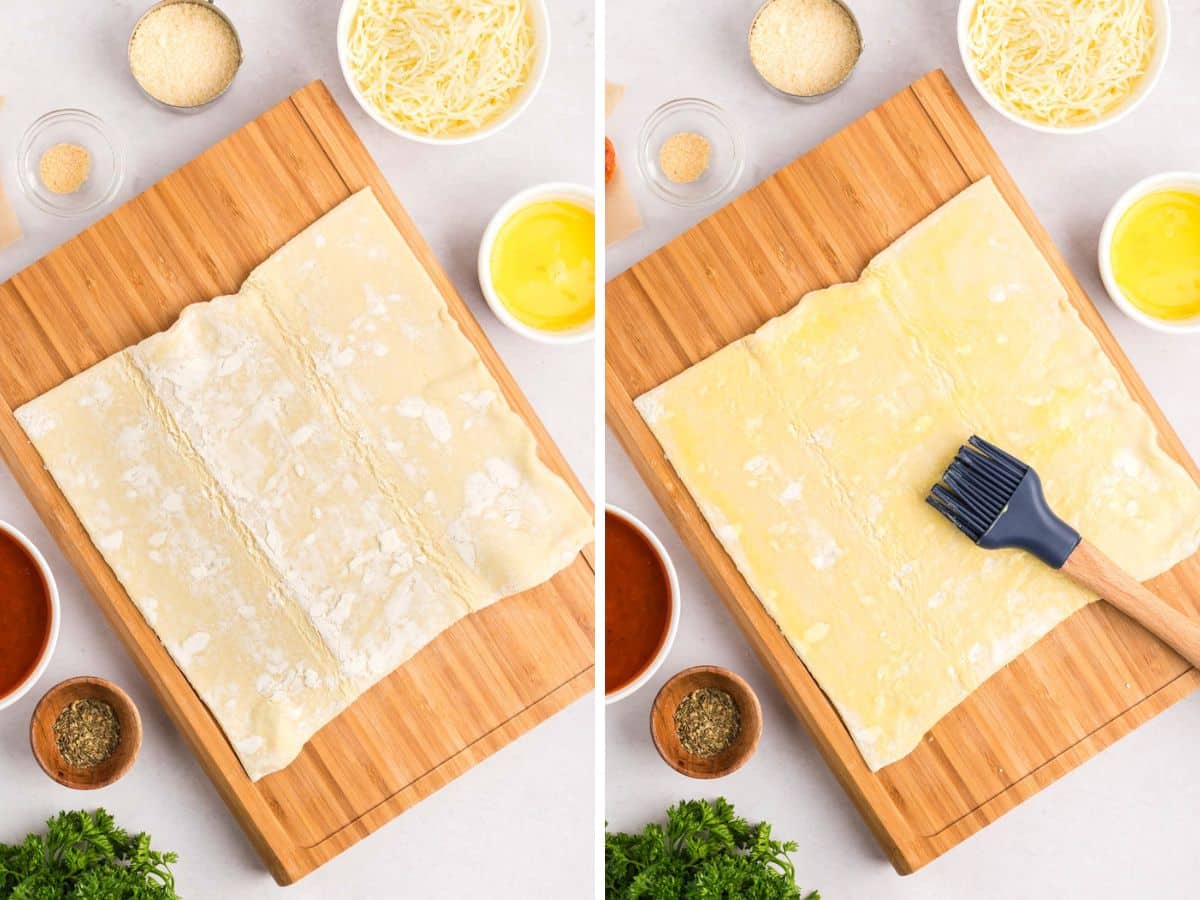 Puff pastry dough on a cutting board and then brushed with egg wash.