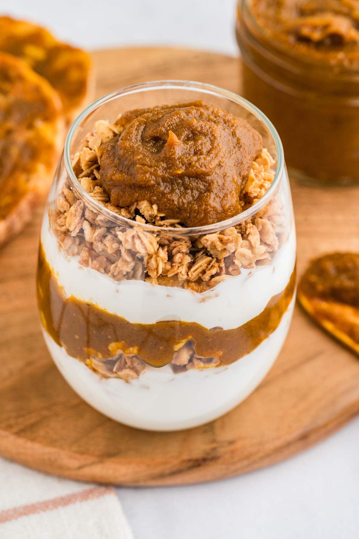 Pumpkin butter layered in a yogurt parfait with granola.