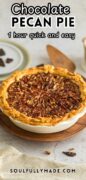 The whole chocolate pecan pie is featured here with a decorative crust.