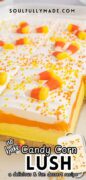 The no-bake Candy Corn Lush is in a white 13 x 9 dish revealing the layers and topped with candy corns and sprinkles.