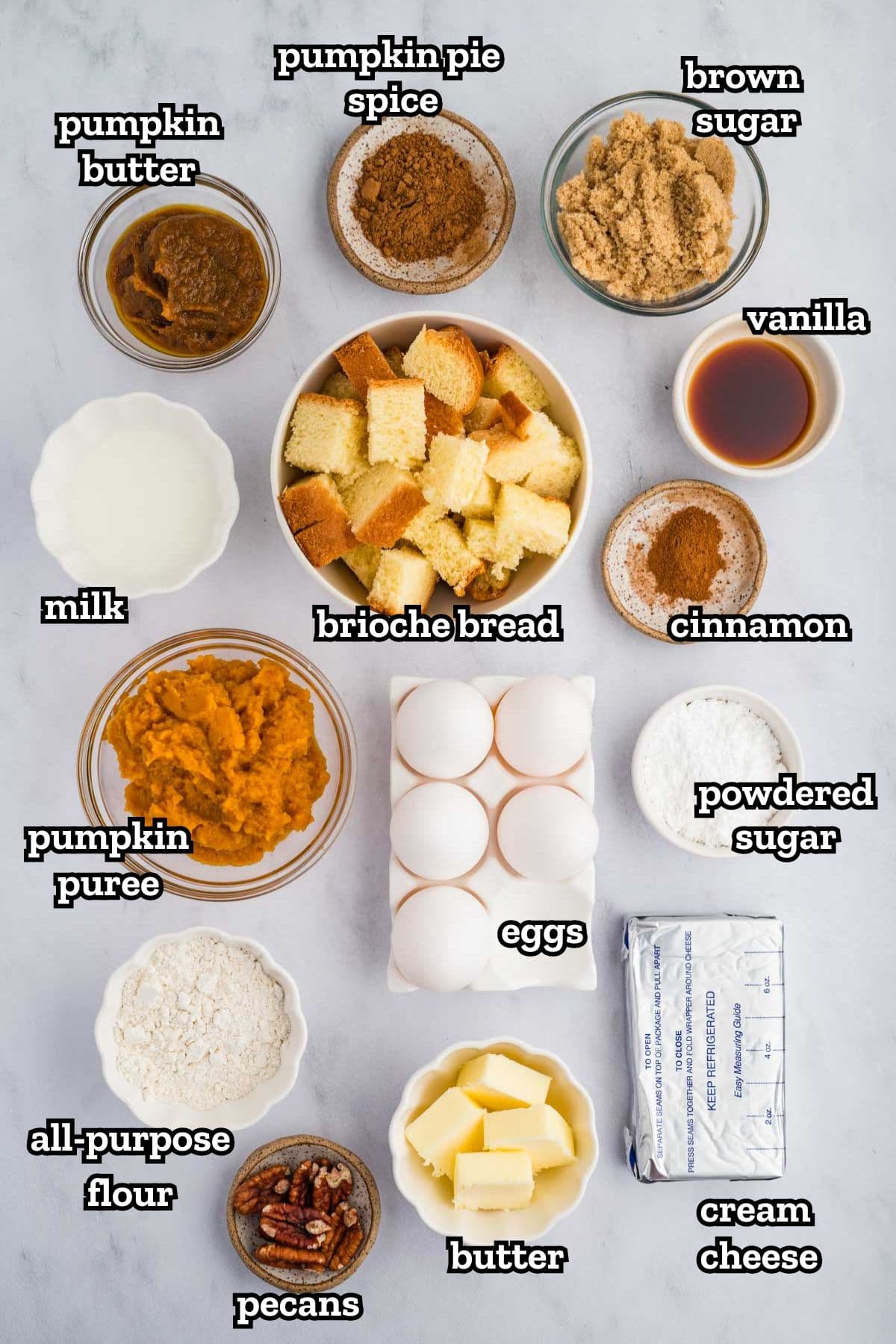 Ingredients needed for pumpkin french toast casserole on a kitchen counter.