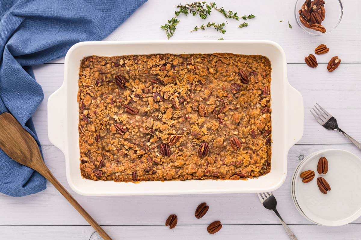 Baked southern sweet potato casserole top with a praline pecan topping.