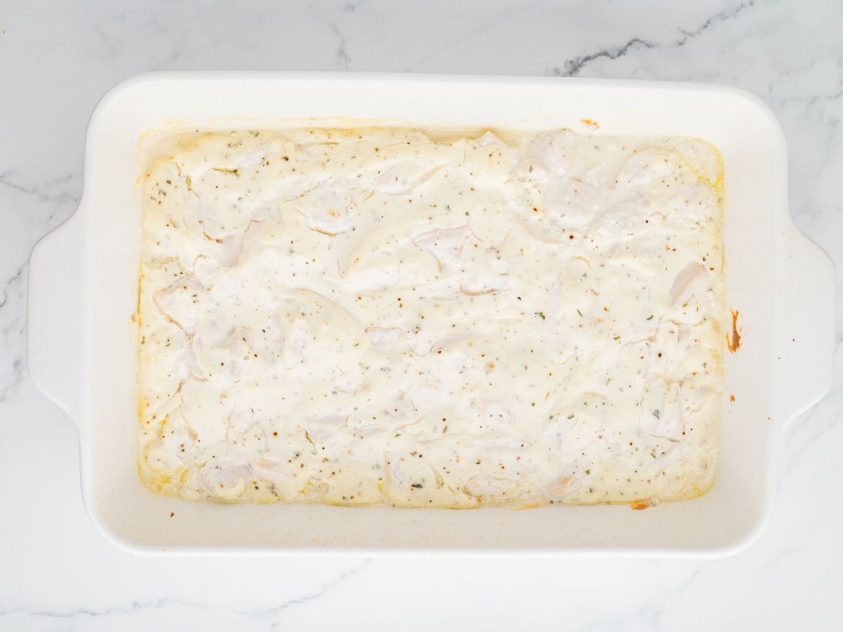 Chicken and cream cheese mixture in a baking dish after being baked.