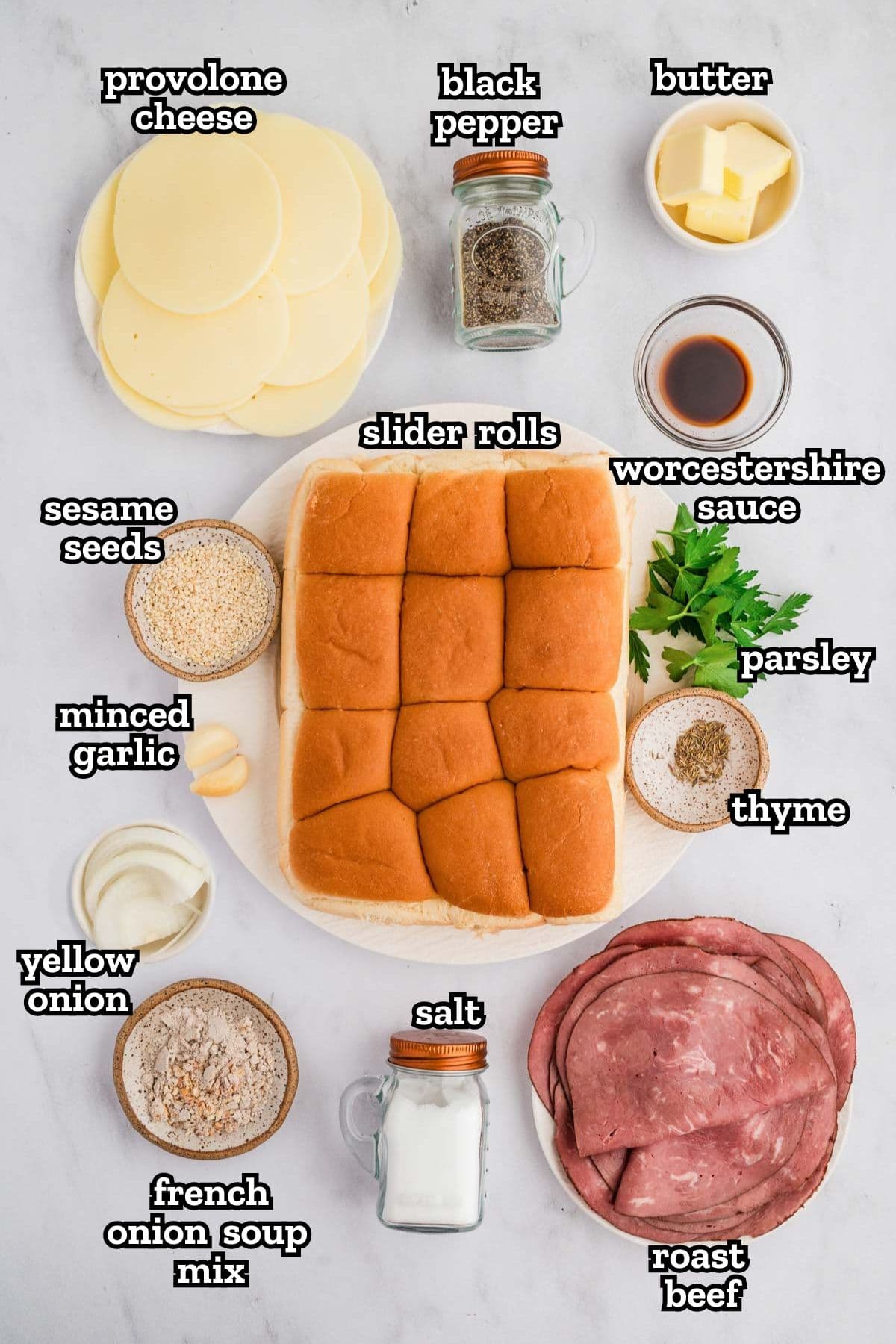 Ingredients needed for French dip sliders on a kitchen counter.