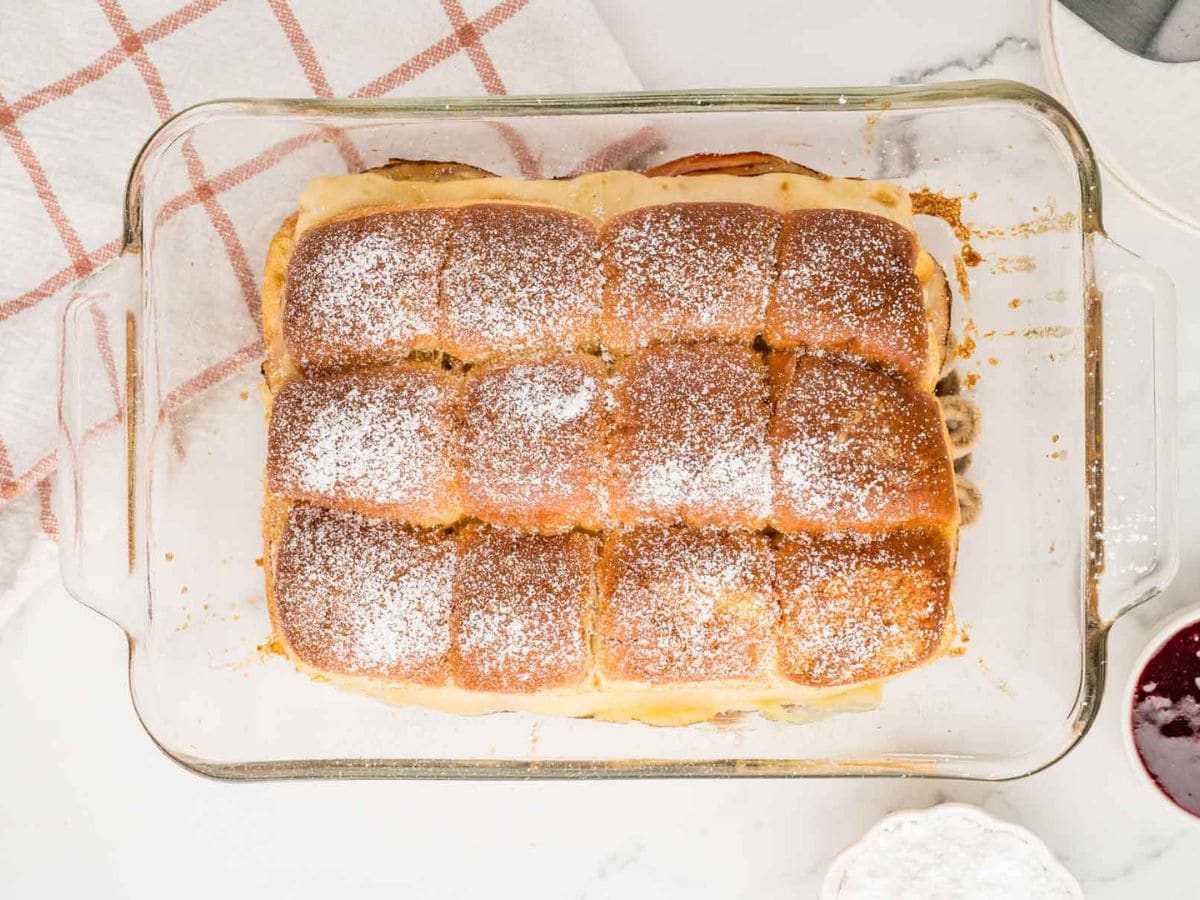 Monte cristo sliders in a baking dish after being baked.