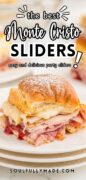 Monte cristo sliders image revealing the dripping cheese inside and the slices of meat stacked high.