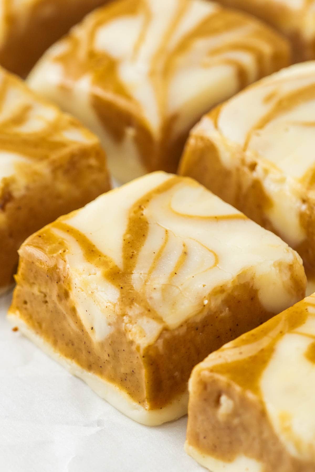 Slices of gingerbread swirl fudge lined on top of each other.