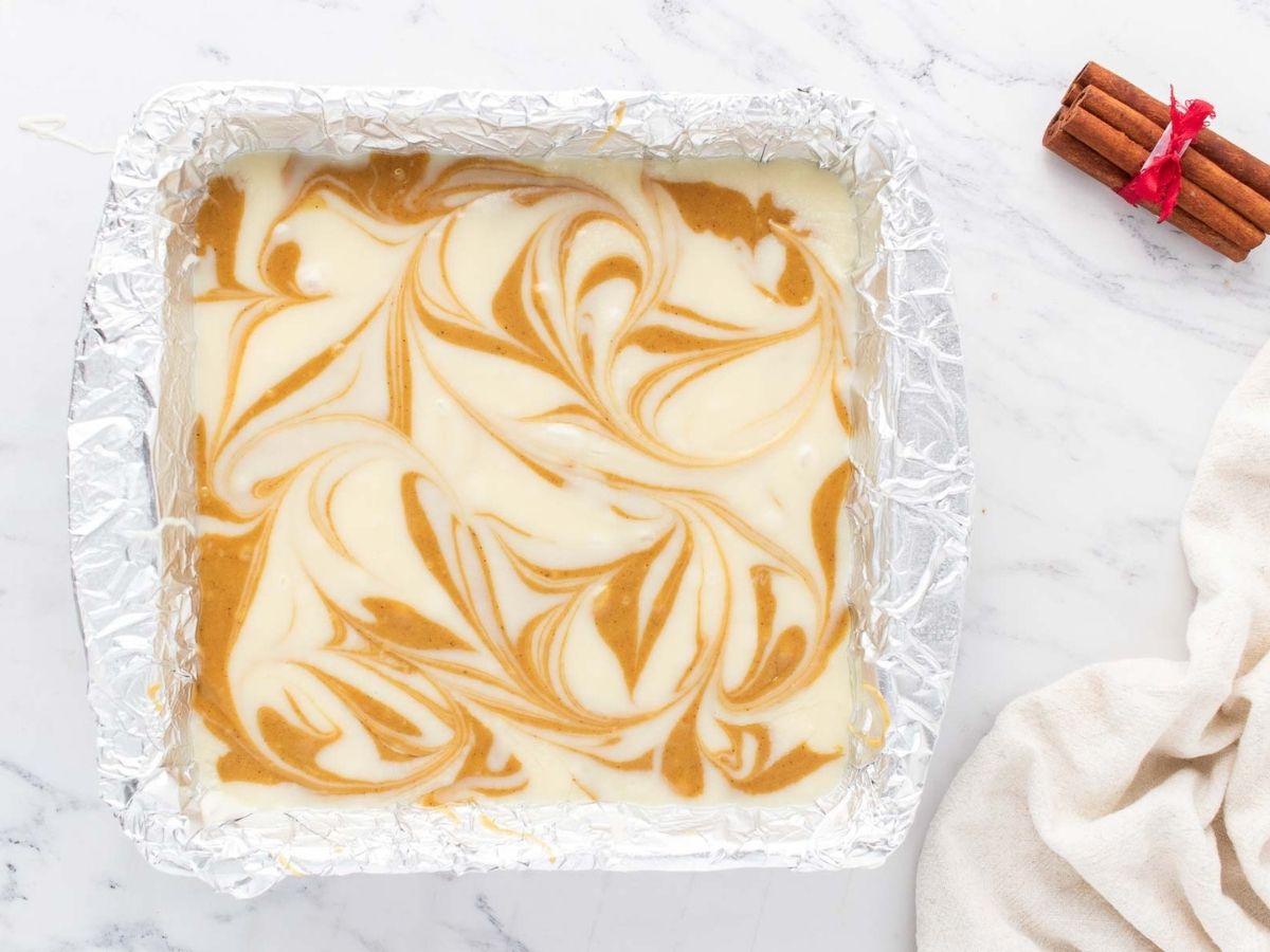 Gingerbread swirl fudge in a prepared baking dish.