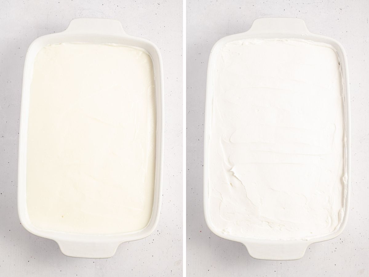 White chocolate pudding being layering in a baking dish with whipped topping on top.