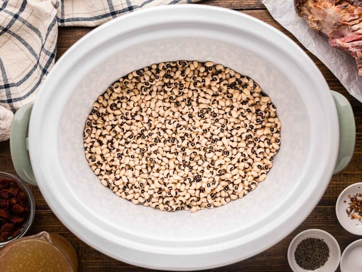 Dried black eyed peas in the crock pot insert.