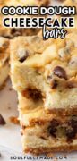 2 Cookie Dough Cheesecake bars are stacked and featured in a closeup shot.