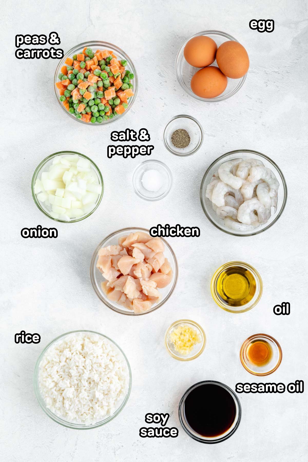 A labeled image of ingredients needed to make shrimp and chicken fried rice.