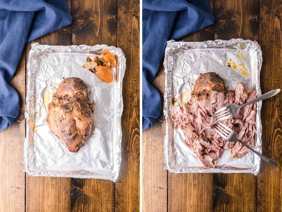 Pork roast placed on a foil lined baking sheet and shredded with forks.