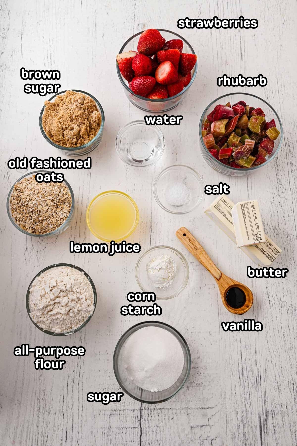 Labeled photo of the ingredients needed to make strawberry rhubarb crumble.