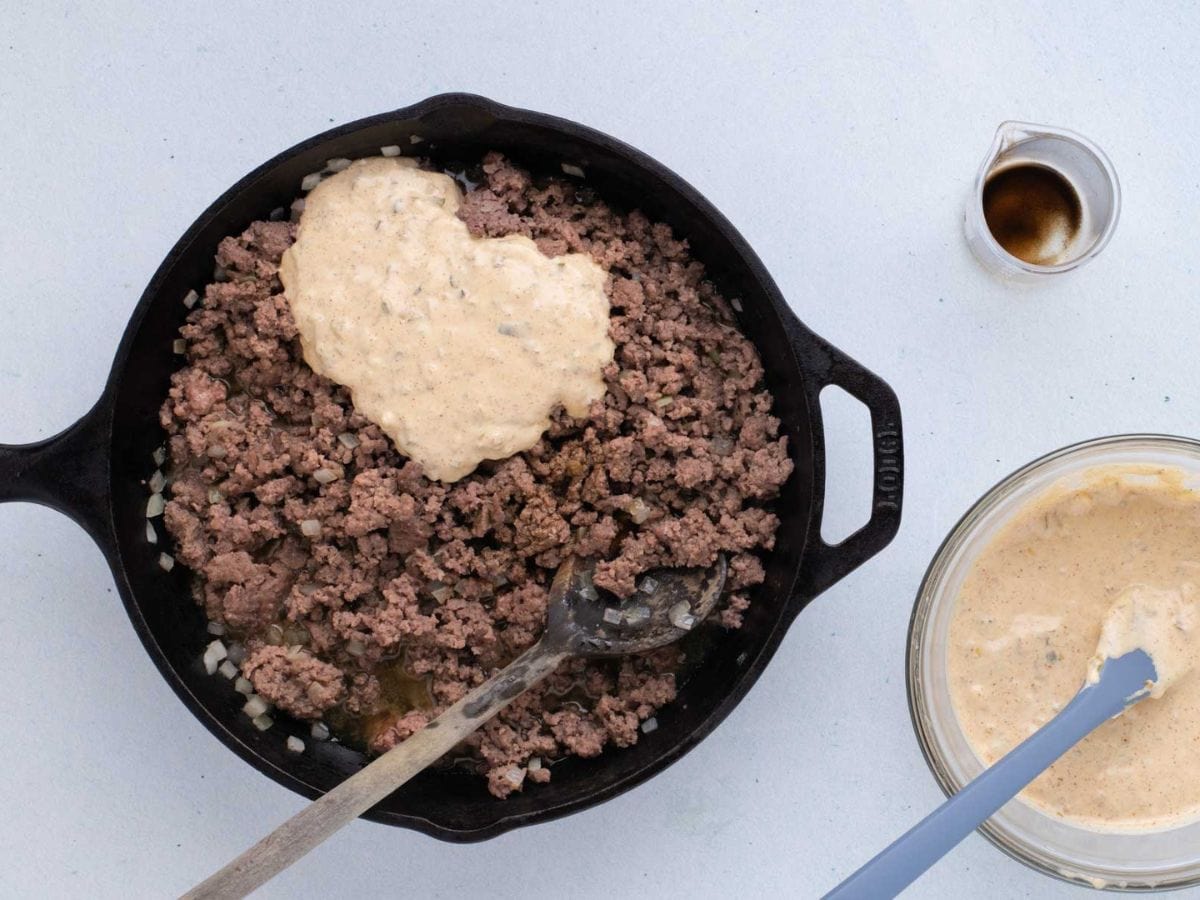 Ground beef mixture with big mac sauce added in a skillet.