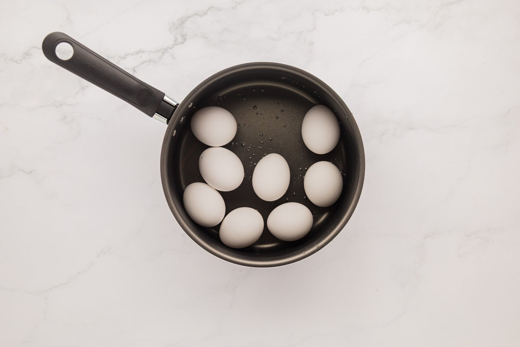 Egg boiling pot bowl in a pot.