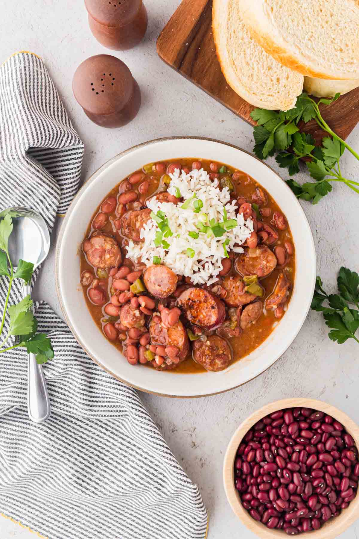 A white bowl filled with red beans and rice.