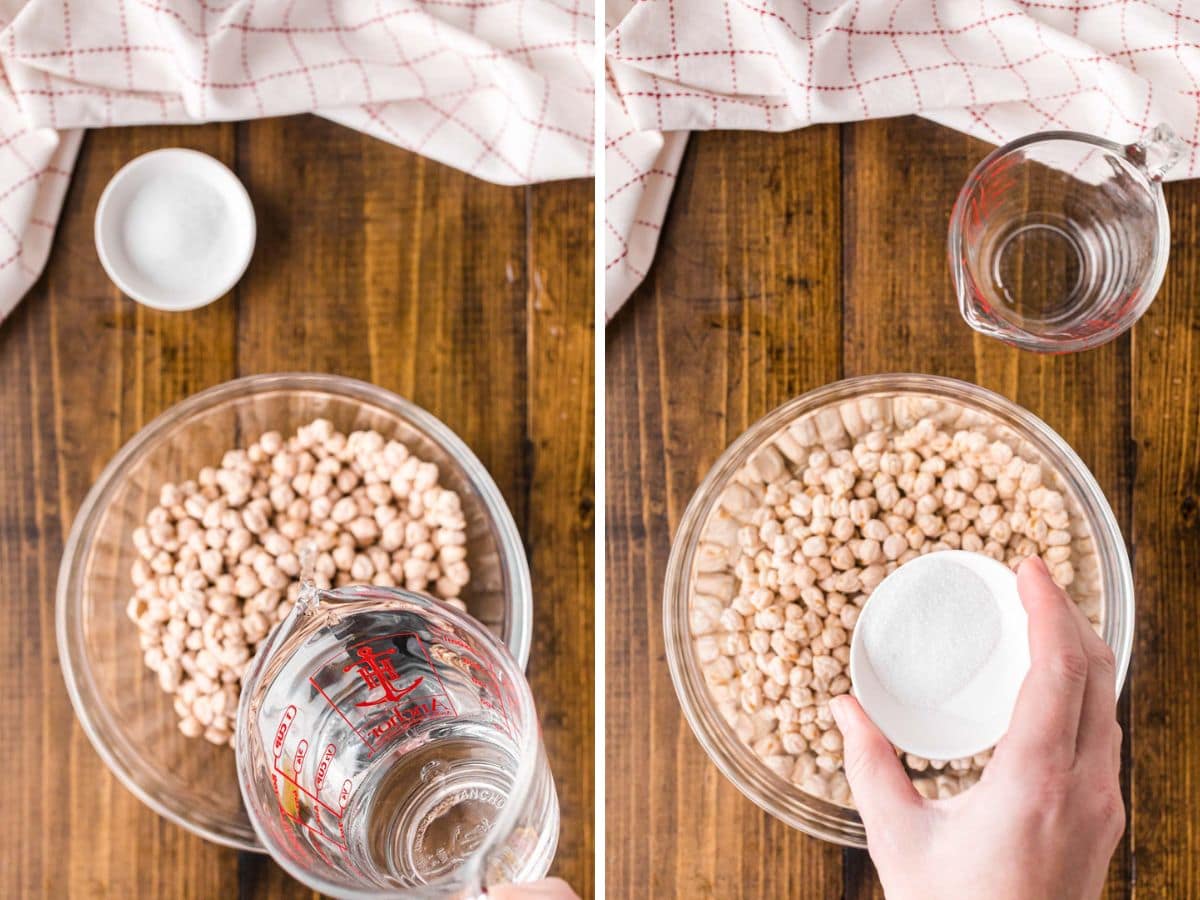 Garbanzo beans in a bowl with water being poured in and salt added.